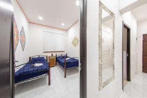 Voodi või voodid majutusasutuse Armena Hostel toas