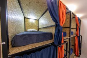 Voodi või voodid majutusasutuse Armena Hostel toas