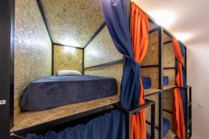 Voodi või voodid majutusasutuse Armena Hostel toas