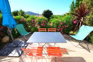 Billede fra billedgalleriet på Charmant appartement calme, avec terrasse fleurie i Calenzana
