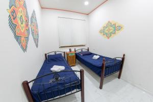Voodi või voodid majutusasutuse Armena Hostel toas