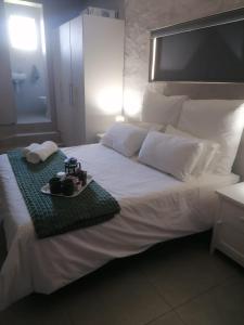 Ένα ή περισσότερα κρεβάτια σε δωμάτιο στο 31 on Ninth