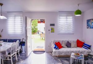 a living room with a couch and a table at Apartments Dajčić in Varaždinske Toplice