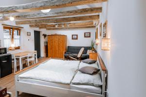 Postel nebo postele na pokoji v ubytování Stüble Loft
