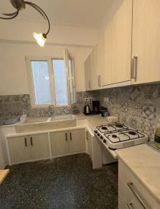 Kuchyň nebo kuchyňský kout v ubytování Petaluda House 5