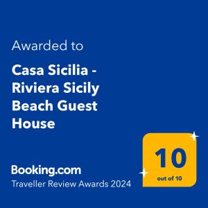 a yellow sign with the number on it at Casa Sicilia - Riviera Sicily Beach Guest House in Donnalucata