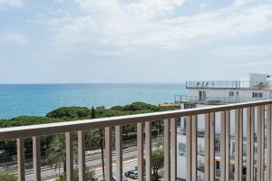 a view of the ocean from the balcony of a condo at Sea view apartments in Malgrat de Mar