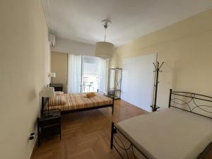 Postel nebo postele na pokoji v ubytování Petaluda House 5