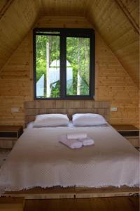 Postel nebo postele na pokoji v ubytování Cottage KOLKHA