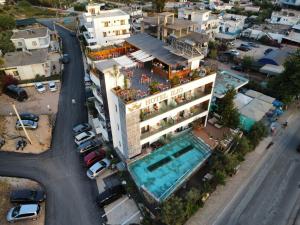 an aerial view of a hotel with a swimming pool at Ilio Boutique Hotel in Ksamil