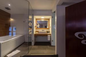 Koupelna v ubytování 1850 Hotel Boutique + 37 fotografií