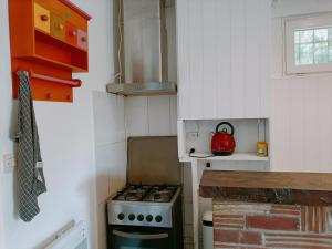 Η κουζίνα ή μικρή κουζίνα στο Charmant appartement indépendant, 5 mn de Rouen, avec terrasse, refait à neuf +6 φωτογραφίες