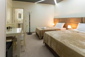 Alko Hotel Shkoder客房内的一张或多张床位