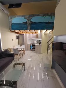 Kuchyň nebo kuchyňský kout v ubytování The loft