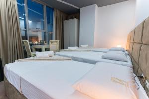 Alko Hotel Shkoder客房内的一张或多张床位