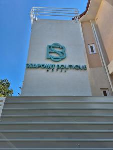 a sign on the side of a building at SEAPOINT Boutique Hotel in Eforie Sud