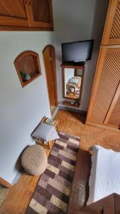 Ένα ή περισσότερα κρεβάτια σε δωμάτιο στο Loft charmoso com área de lazer