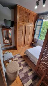 Ένα ή περισσότερα κρεβάτια σε δωμάτιο στο Loft charmoso com área de lazer