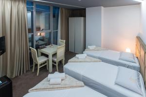 Alko Hotel Shkoder客房内的一张或多张床位