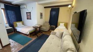 Postel nebo postele na pokoji v ubytování Hotel Konak Tammy Platičevo - Šabac