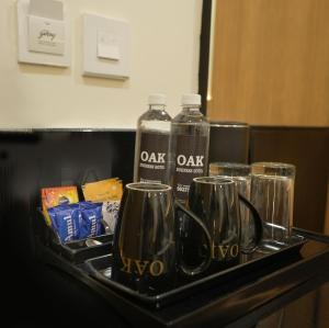 Příslušenství pro přípravu čaje a kávy v ubytování Oak Business Hotel
