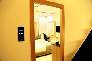 TV a/nebo společenská místnost v ubytování Oak Business Hotel
