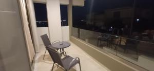 Ein Balkon oder eine Terrasse in der Unterkunft ALPHA APARTMENTS Free Shuttle from and to the Airport
