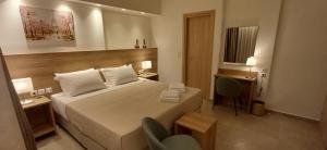 Ein Bett oder Betten in einem Zimmer der Unterkunft ALPHA APARTMENTS Free Shuttle from and to the Airport
