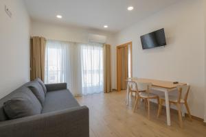 Khu vực ghế ngồi tại Villa Harbour Rooms & Apartments