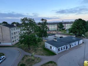 an overhead view of a city with buildings and a street at Aleksandra Apartment in Ventspils
