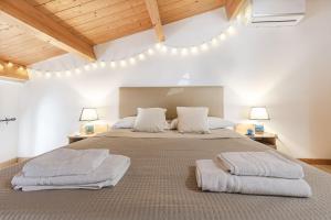 Postel nebo postele na pokoji v ubytování Santa Chiara Apartment - Self Check-in H24 - Wi-Fi veloce - Vicino al centro