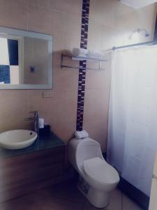 Koupelna v ubytování Hotel Presidente Beach Salinas