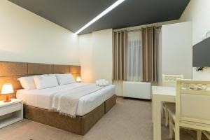 Alko Hotel Shkoder客房内的一张或多张床位