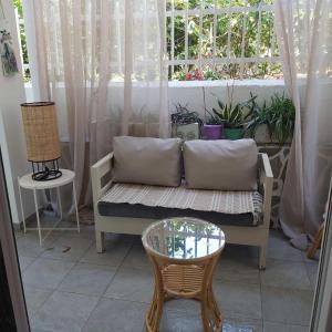 A seating area at Eytyhias Yard apartments in Poros