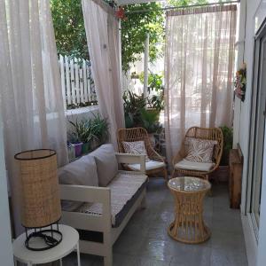 A seating area at Eytyhias Yard apartments in Poros