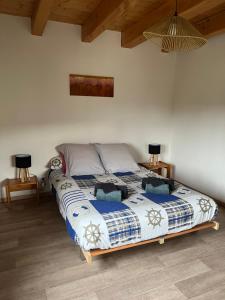 Letto o letti in una camera di Ancienne ferme de Charles