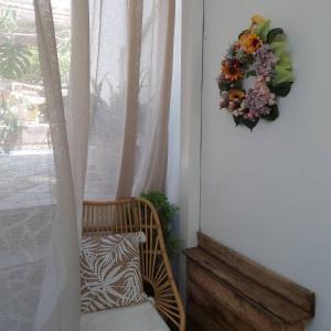 A seating area at Eytyhias Yard apartments in Poros