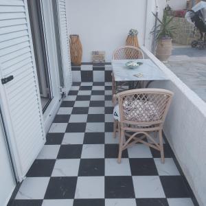 A patio or other outdoor area at Eytyhias Yard apartments in Poros