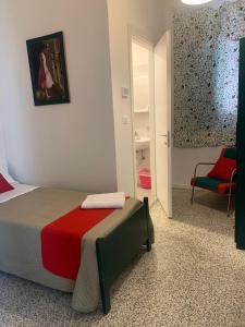 Postel nebo postele na pokoji v ubytování Hotel Migani