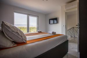 Postel nebo postele na pokoji v ubytování BRAND NEW! Villa Adriatic Bay1 with a private pool + 37 fotografií
