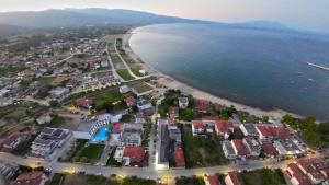 an aerial view of a town next to the beach at Amalia in Stavros