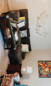a bunch of pillows are stacked on a wall at 310 Priscilla Dr Apartment in Fort Walton Beach