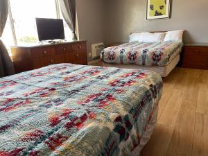 Postel nebo postele na pokoji v ubytování Valley Motel El Cajon San Diego