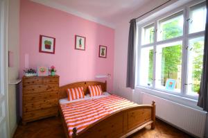 Postel nebo postele na pokoji v ubytování Travel&Joy backpackers