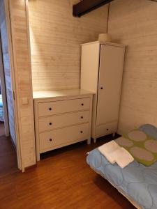 Postel nebo postele na pokoji v ubytování Dorė