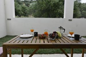 Nápoje v ubytování Vegera Holiday Homes + 23 fotografií
