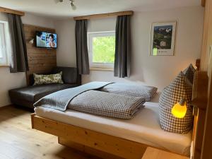 Voodi või voodid majutusasutuse Sagebruenndle Appartements toas