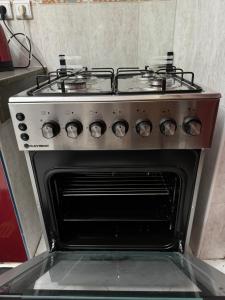 an oven with a stove top on top of it at Tranquility In the Center of Fez in Fez +14 photos