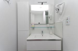 Et badeværelse på Apartment Uptown + 20 billeder