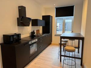 Dapur atau dapur kecil di Urbanchic Appartement cosy 1B +18 gambar